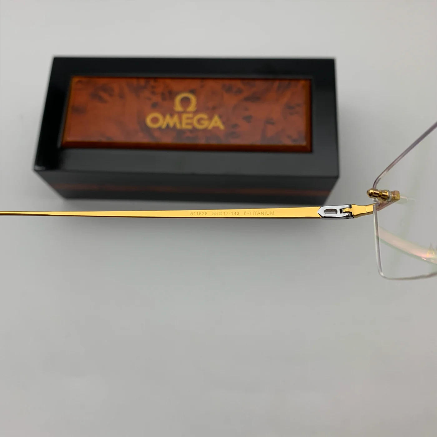 Gọng Kính Thời Trang Omega 511628 Mạ Vàng 18K Gold Titan Khoan 3 Mảnh Fullbox