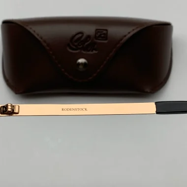 Kính Rodenstock cổ Đức mí nhựa đen mạ vàng mắt đổi màu